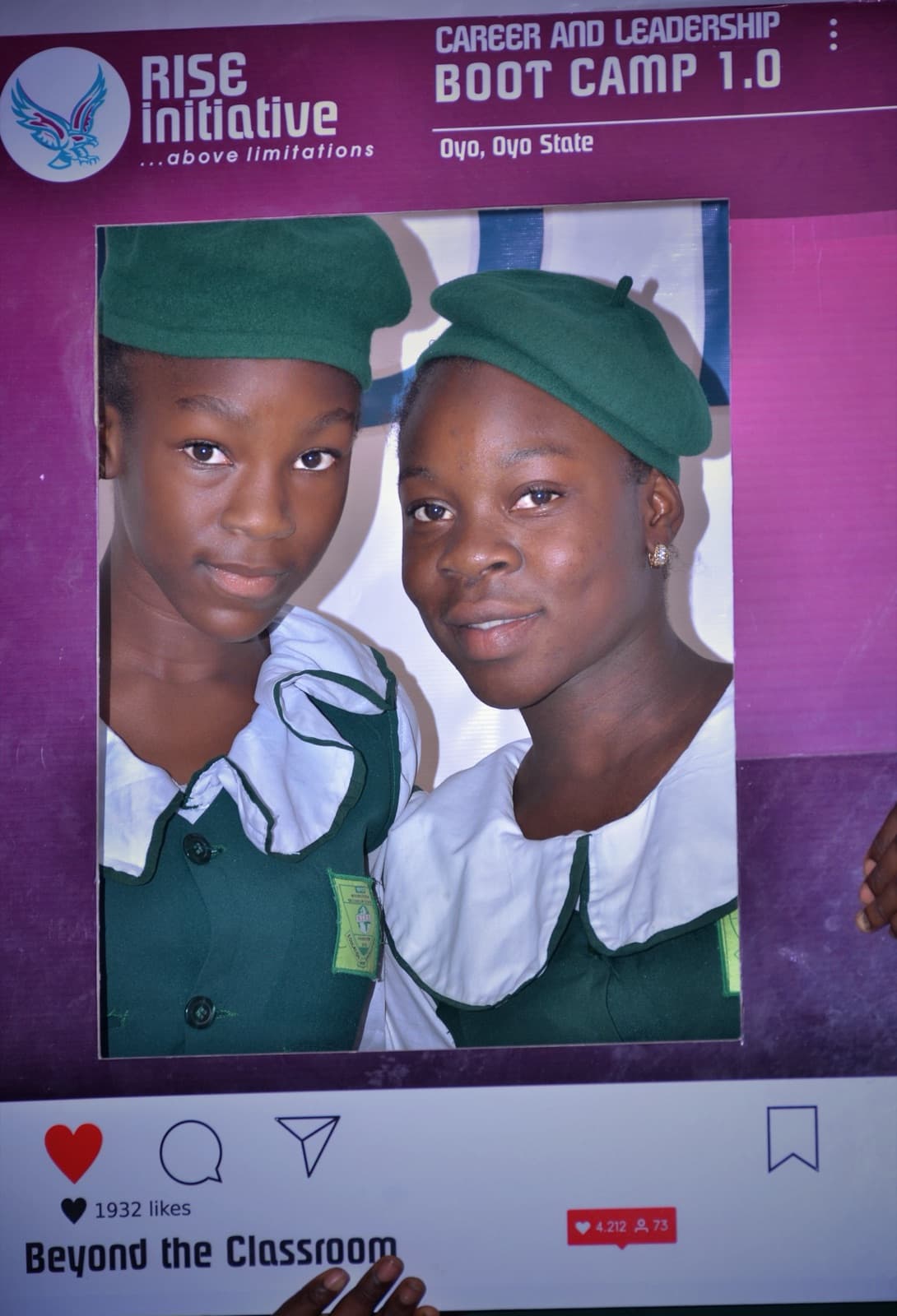 Two students at the RISE Initiative photo frame during the 2019 bootcamp at SPED International Secondary School.